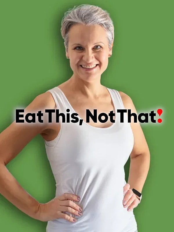 Smiling woman promoting healthy eating choices.