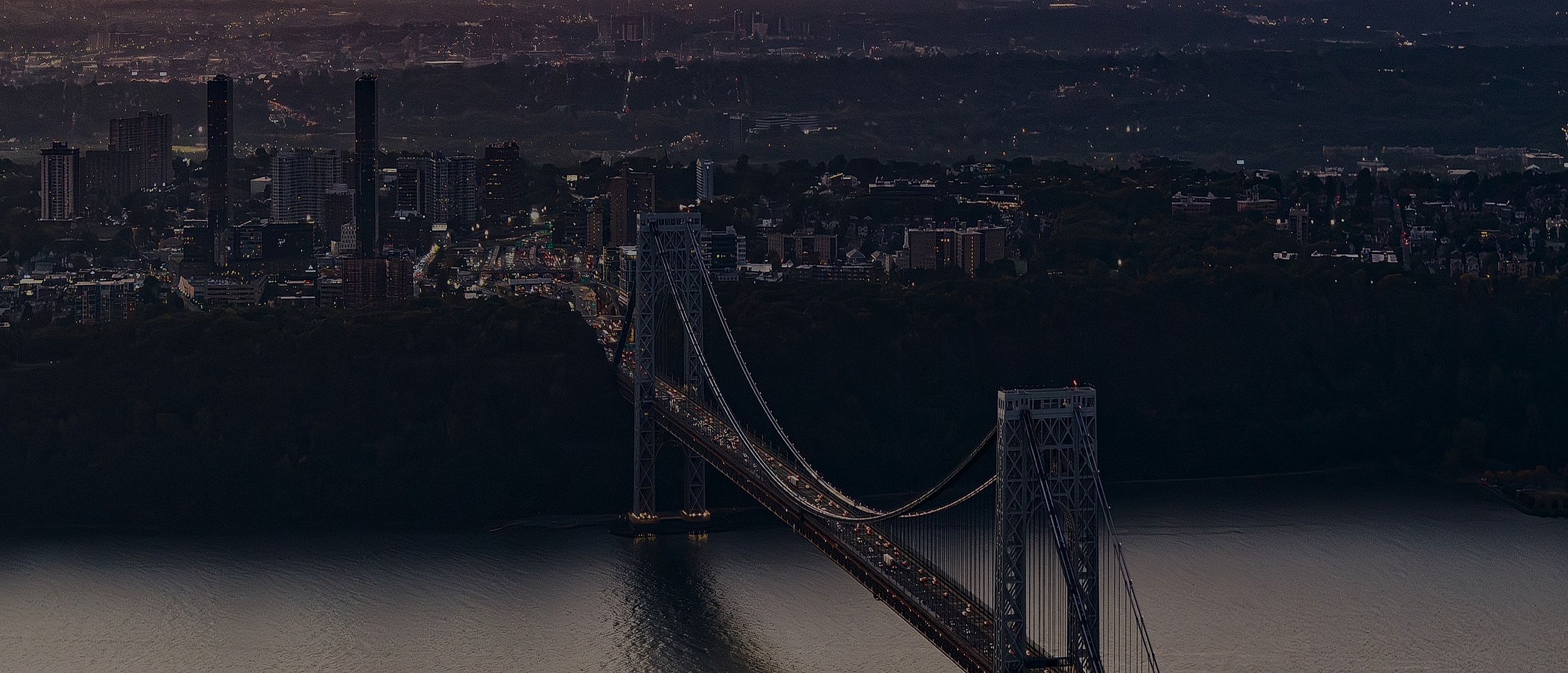 Bridge with city skyline